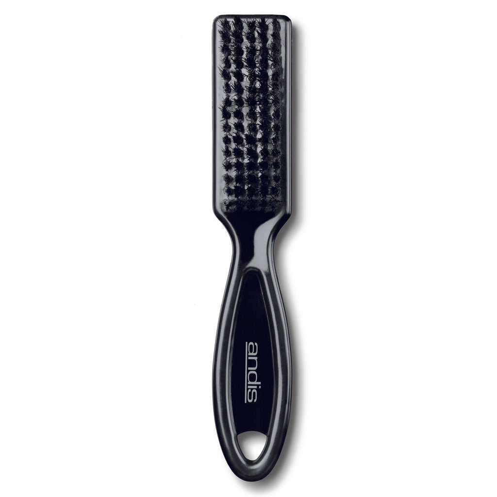 Black hairbrush with textured head on a white background