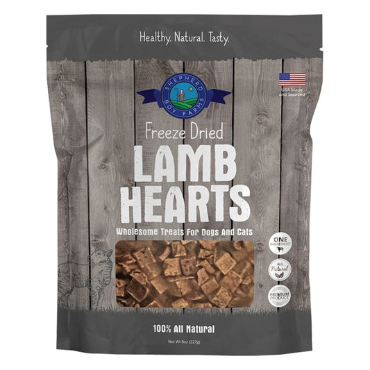 Package of freeze-dried lamb hearts for dogs and cats on a wooden background