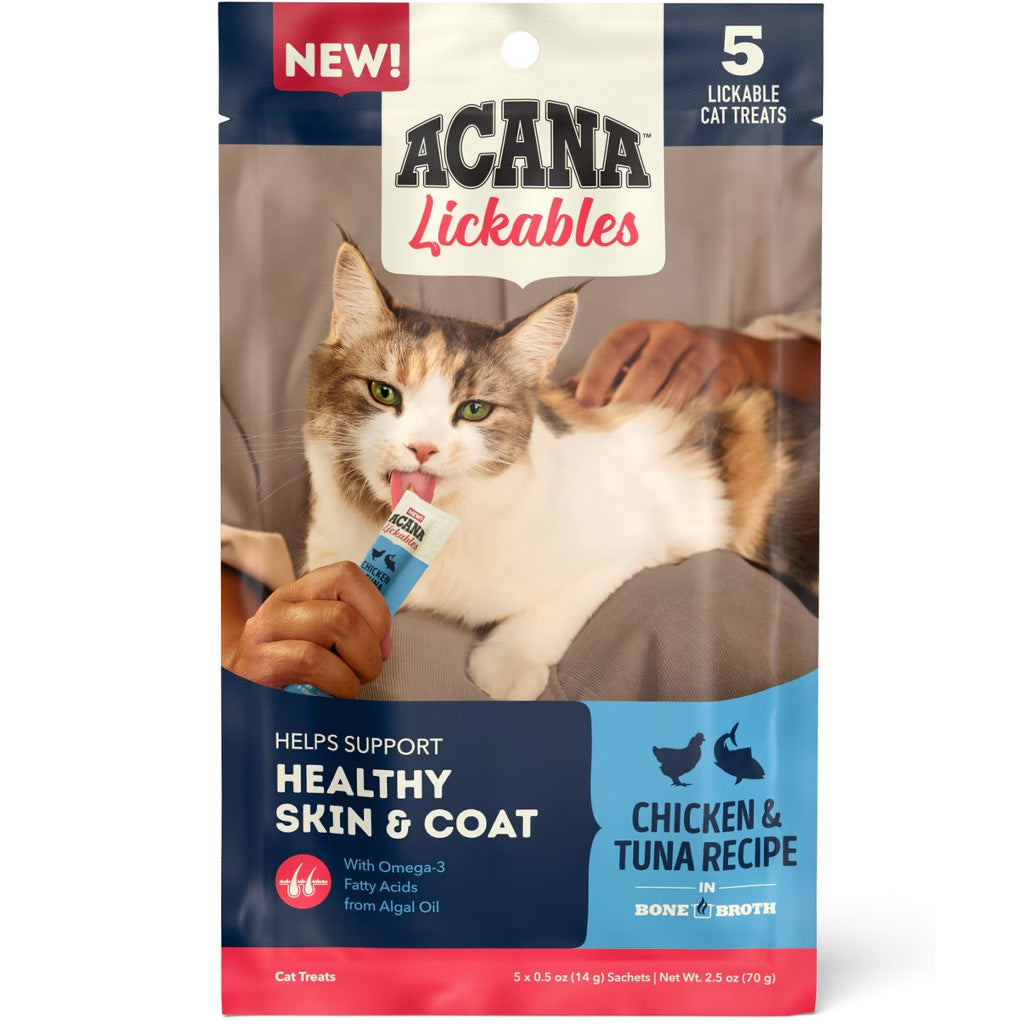 Acana Lickables cat treats packaging with a cat holding a treat.