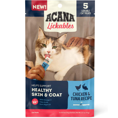 Acana Lickables cat treats packaging with a cat holding a treat.