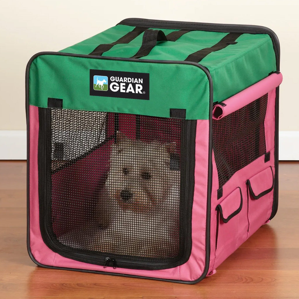 Pet carrier with a small animal inside, featuring a visible brand logo on a neutral background.