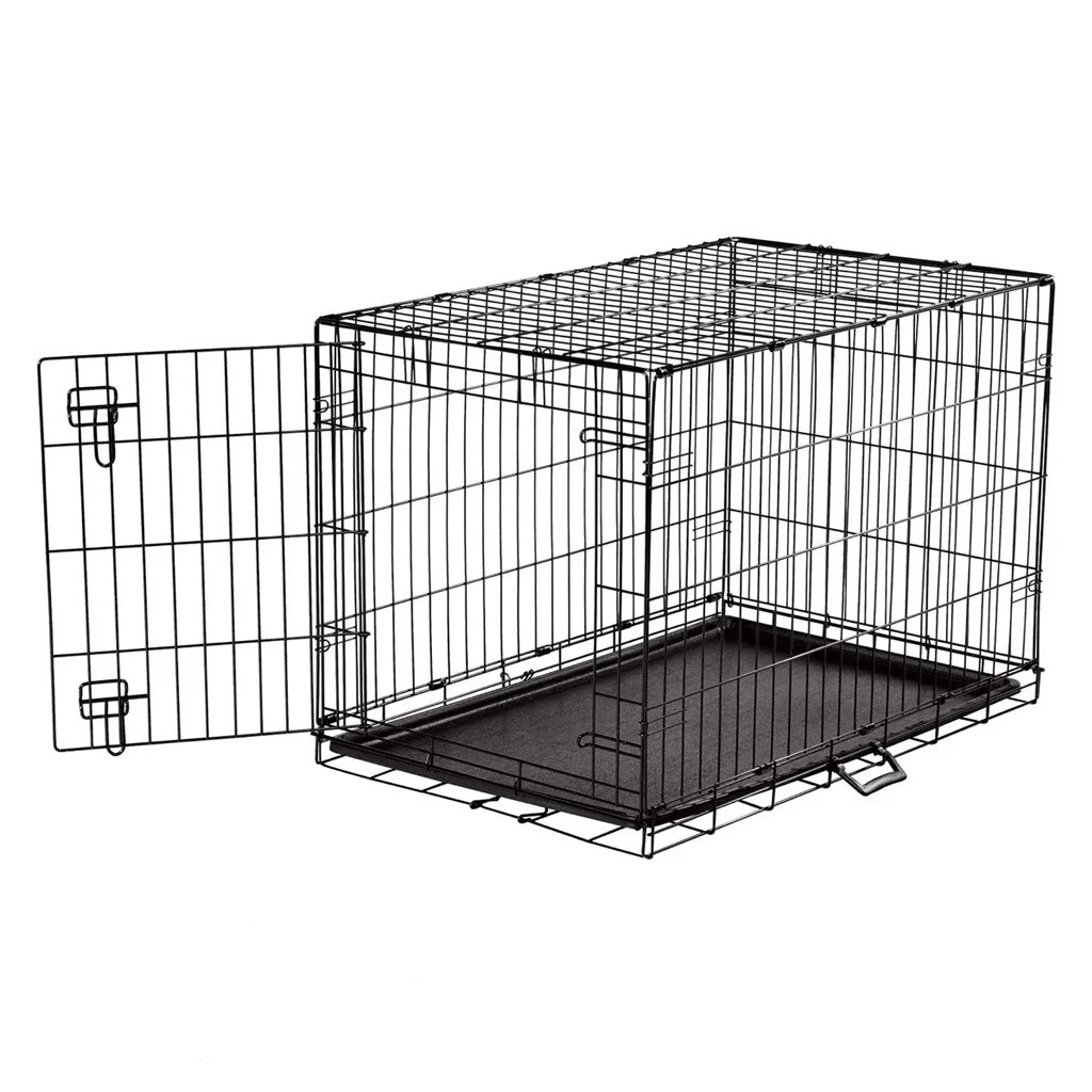 Black metal pet crate on a white background