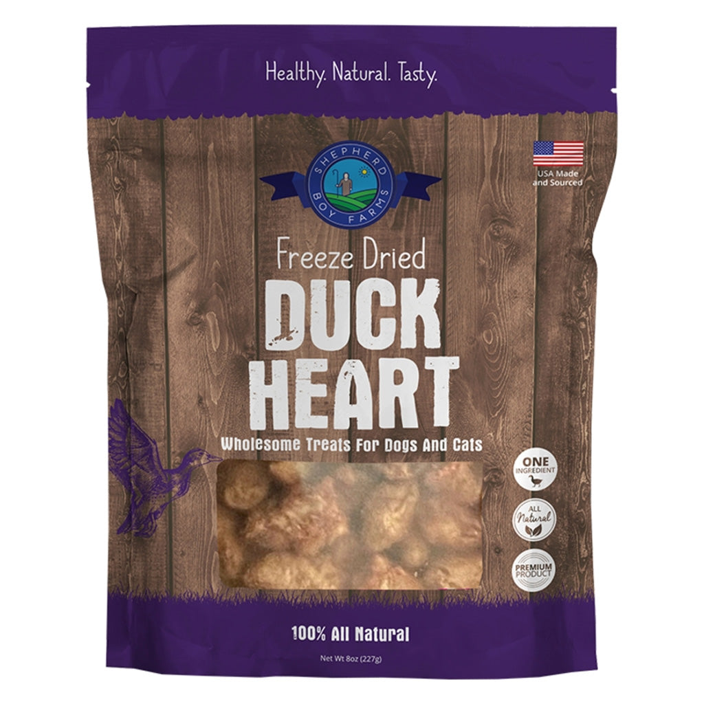 Package of freeze-dried duck heart treats for dogs and cats with a wooden texture and purple accents.